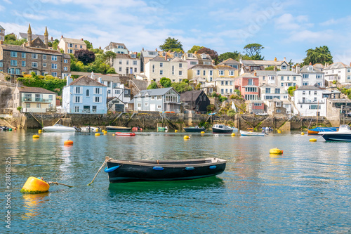 Boats moored at beautiful Cornish harbour town Polruan in South Cornwall, England