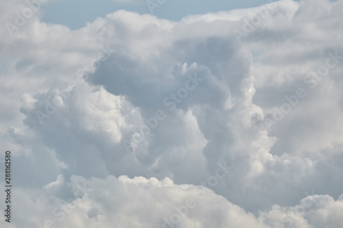 Beautiful cumulus clouds a summer day