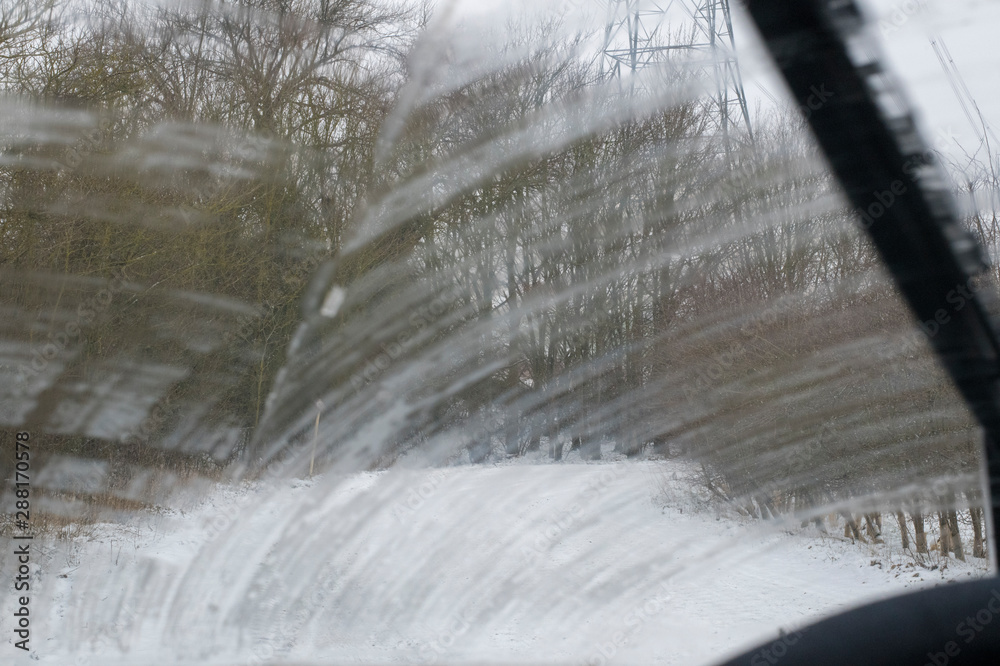 Driving hazards with frozen windscreen washer jets and a salt stained