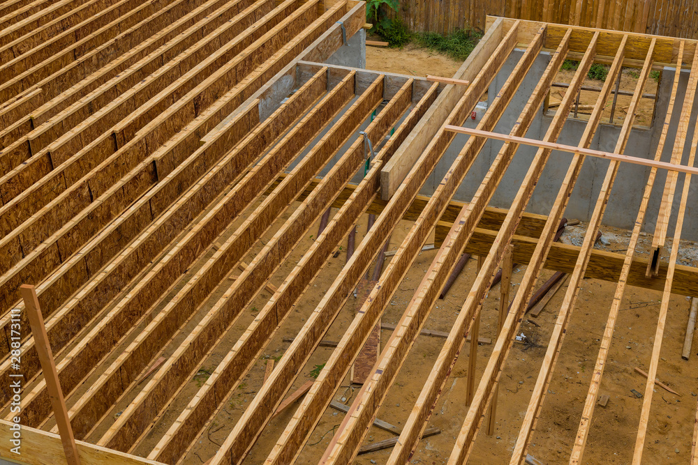 Engineered wood floor joist on a new custom home Engineered wood floor joist on a new custom home