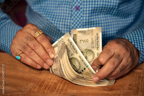 Businessman Counting Money Background