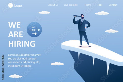 Businessman on top of a mountain looks into a telescope and hires.