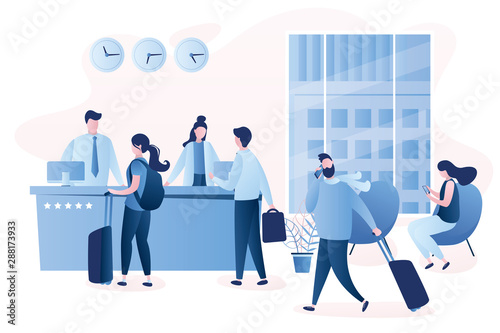 Hotel reception desk,interior with furniture,people receptionists and travellers with luggage
