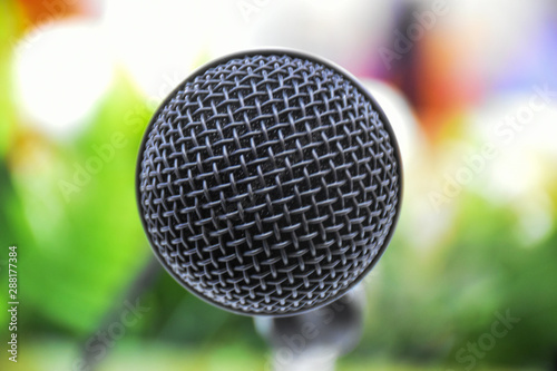 in front of microphone texture and background in education hall and bright light 