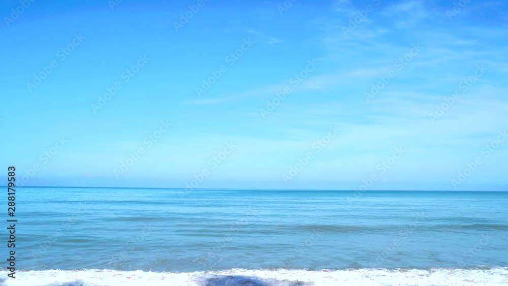 Wild big Phuket Thailand tropical island beach. Blue turquoise sea and white sand background. Beautiful vacation blue turquoise sea water. Andaman Ocean. Wild big Phuket Thailand tropical island beach. Blue turquoise sea and white sand background. Beautiful vacation blue turquoise sea water. Andaman Ocean.