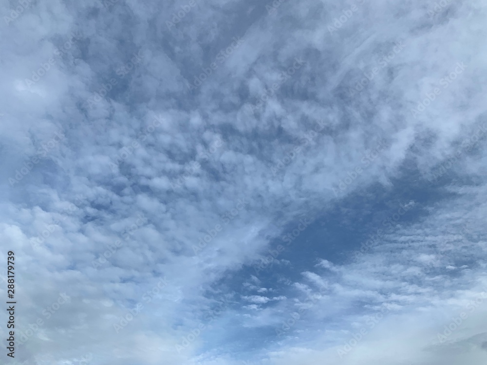 Fototapeta premium A part of white clouds on the blue sky background