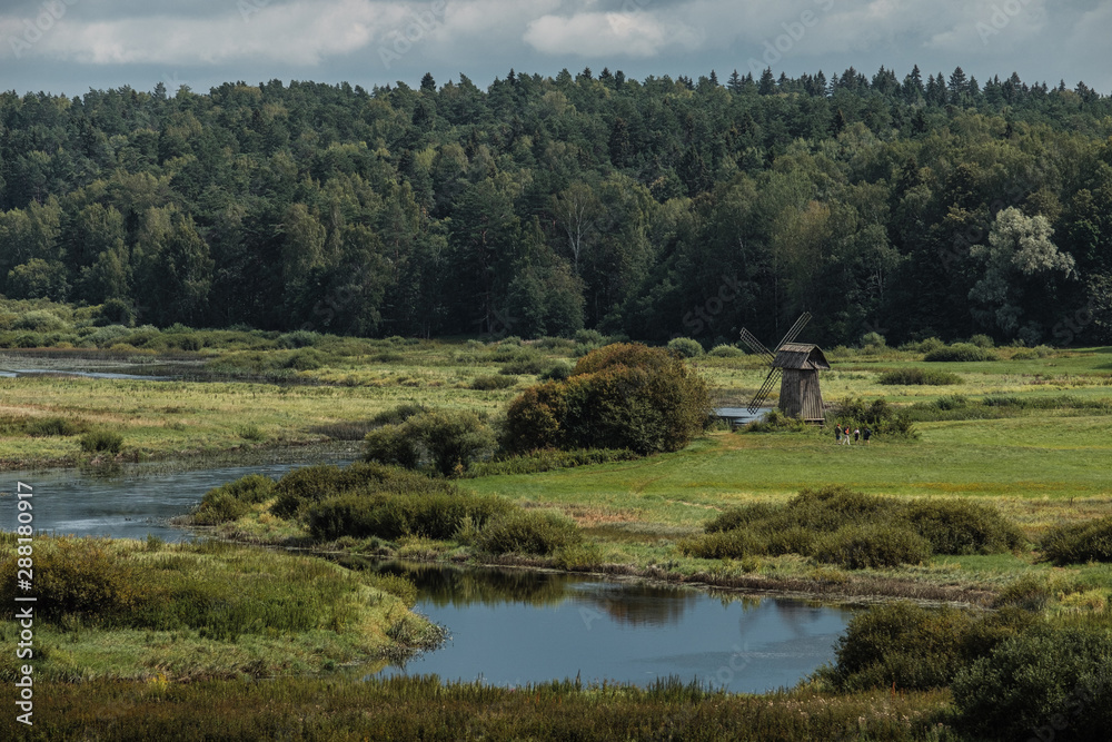 Fototapeta premium Old windmill in Mikhailovskoe, a family estate of the famous Russian poet Alexander Pushkin.