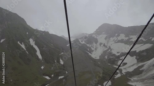 cableway in the resort of Rosa Khutor in Sochi rides in the clouds