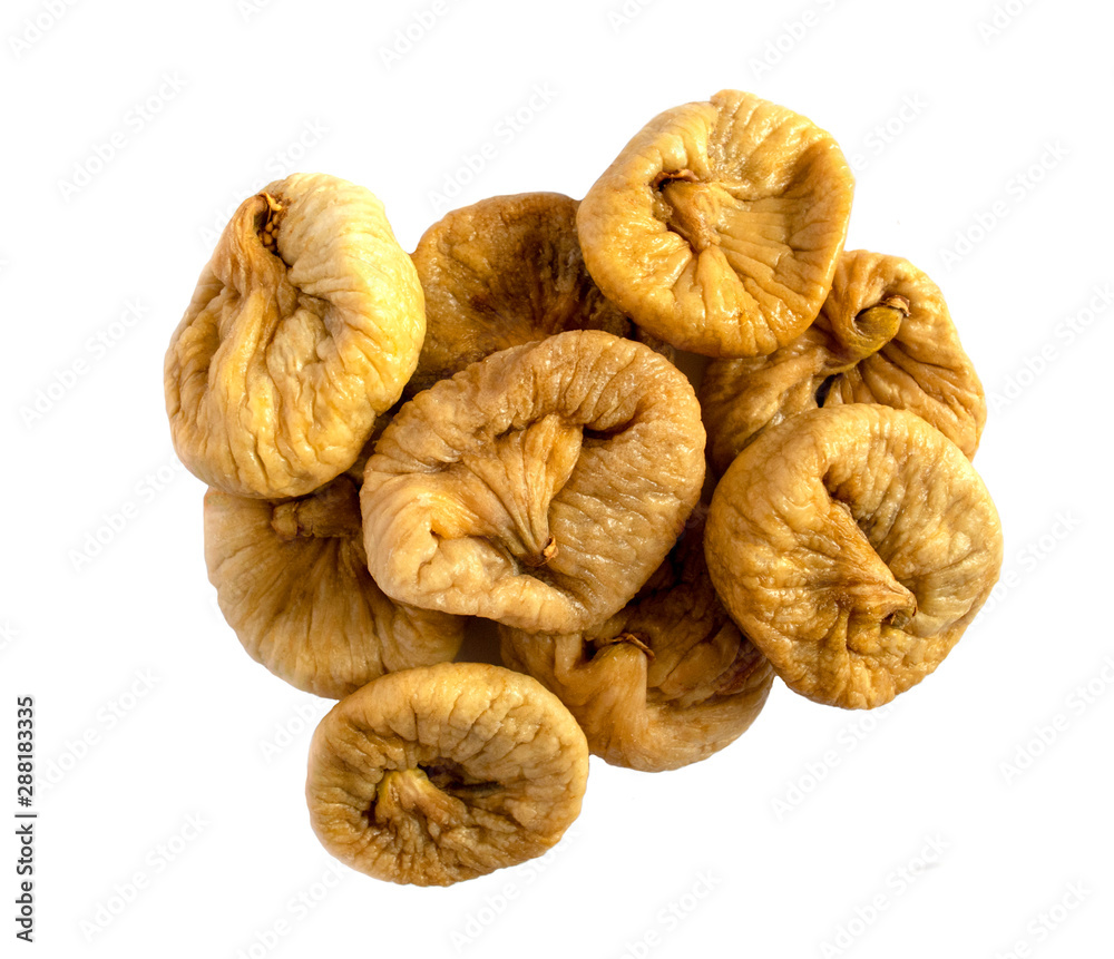 Dried figs isolated. Close up of organic dried fruits on white background. Top view. Pile of dried figs Dried figs isolated. Close up of organic dried fruits on white background. Top view. Pile of dried figs