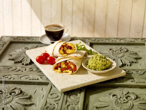 Bacon & Scambled Egg Wraps with coffee & Creamed Avocado photo