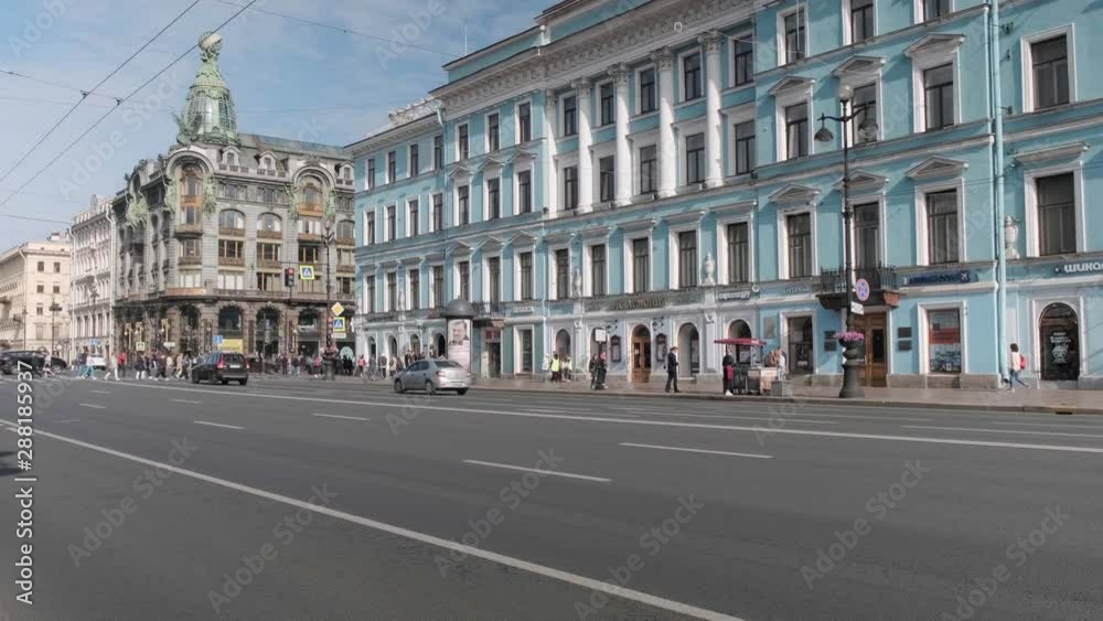 ST. PETERSBURG, RUSSIA - AUGUST 7, 2019: traffic on Nevsky Avenue one summer morning ST. PETERSBURG, RUSSIA - AUGUST 7, 2019: traffic on Nevsky Avenue one summer morning