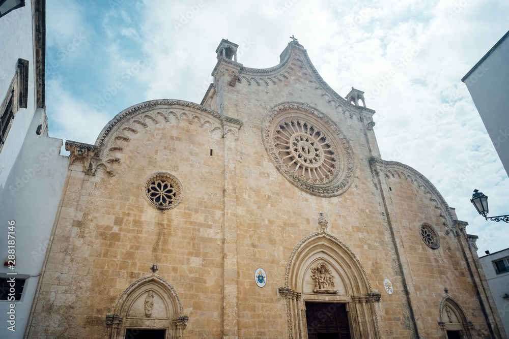 Ostuni, Puglia Italy - Friday 23 August 2019: facade of the cathedral of Ostuni