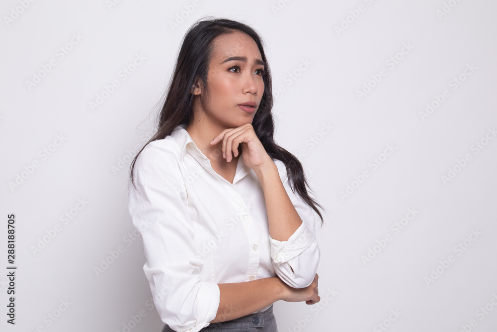 Serious young Asian woman look away. Serious young Asian woman look away.