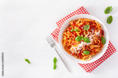 tagliatelle pasta with tomato sauce parmesan basil