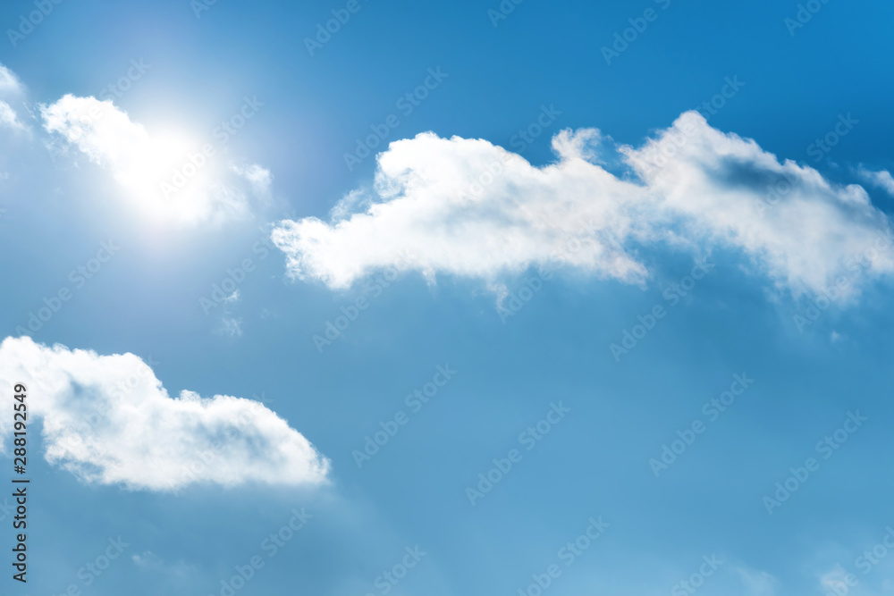 Sun with sun rays on the blue sky with clouds Sun with sun rays on the blue sky with clouds