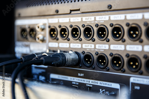 Audio snake and stage box with xlr cables and jacks at a live event photo