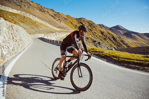 Cyclist braking downhill.
