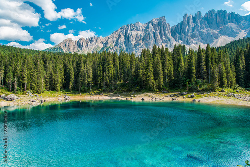 Enchanted Panorama. Lake of Carezza. Dolomites, Italy photo