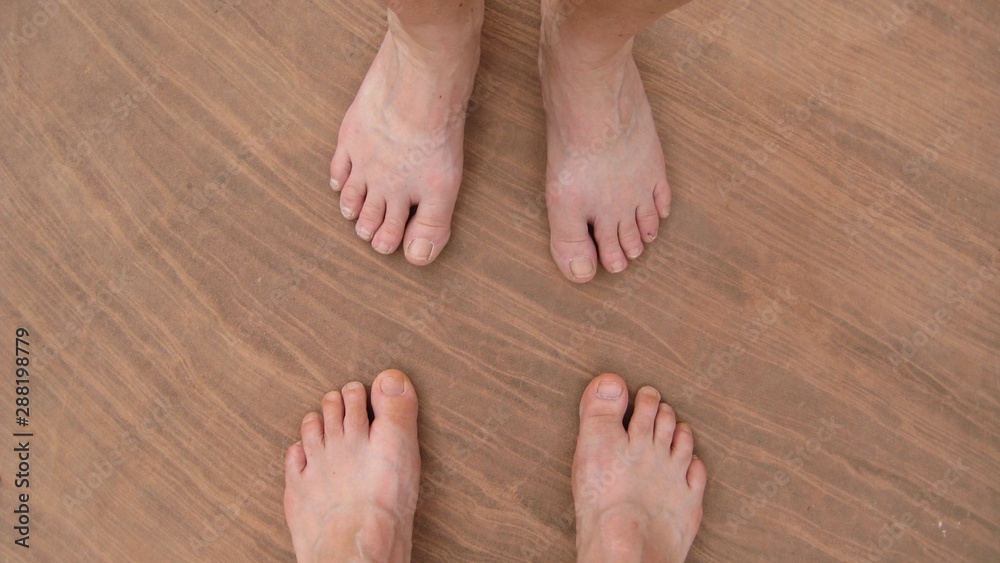 Bare feet on sandstone Arches National Parc Bare feet on sandstone Arches National Parc