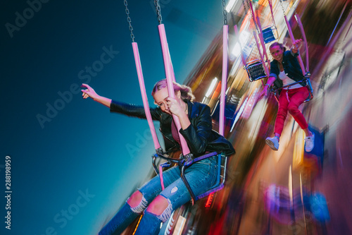 mother and daughter at amusement park photo