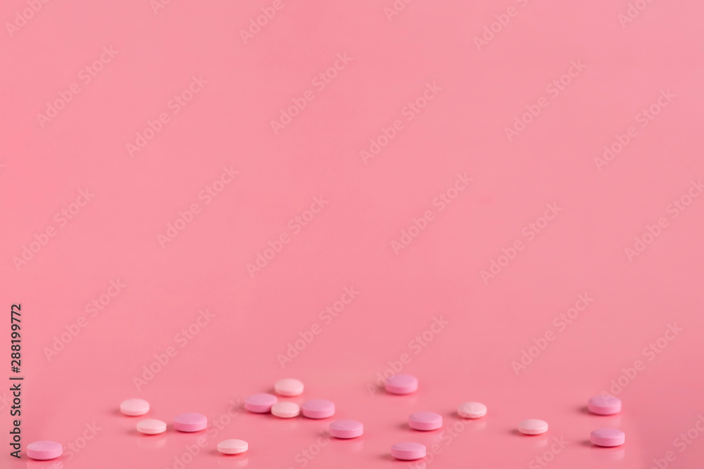 Pink round pills with a top spot for a text banner