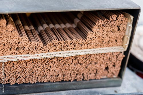incense sticks at buddhist temple photo