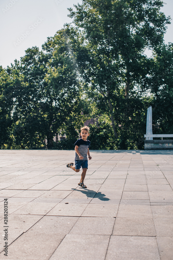 Happy Kid Running on a Plato Happy Kid Running on a Plato