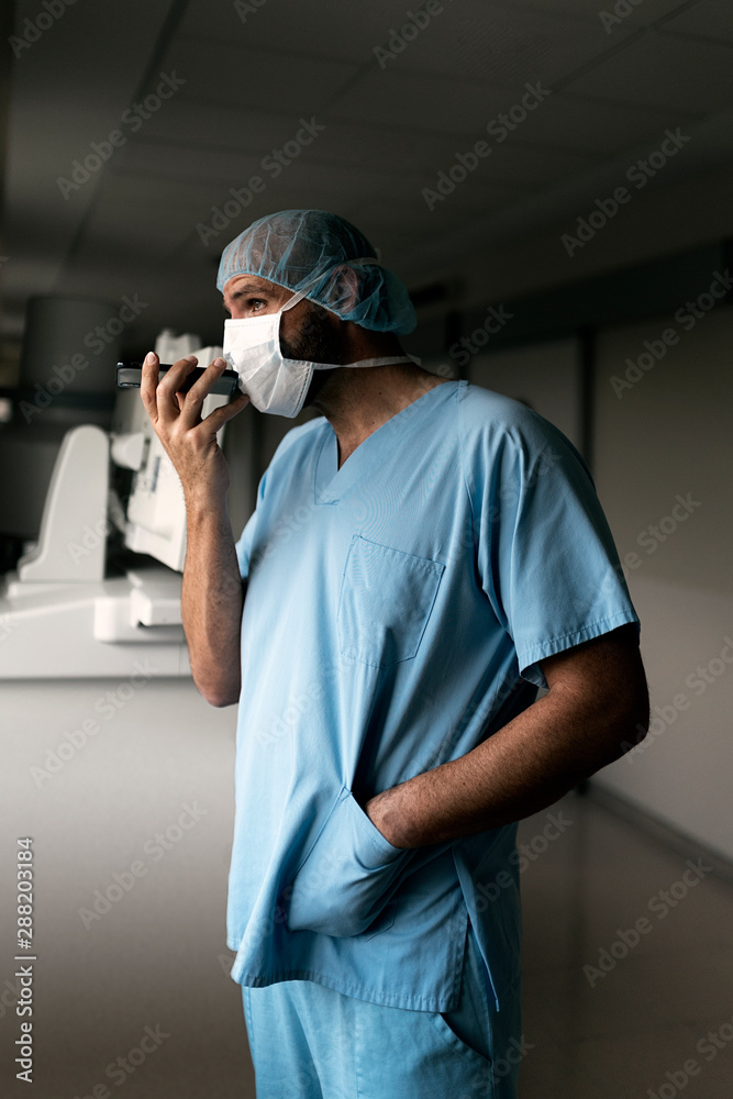 Doctor using mobile in hospital Doctor using mobile in hospital
