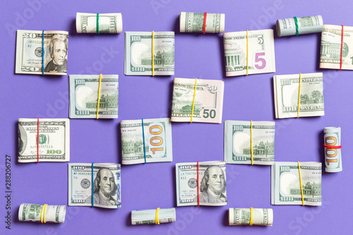 colored Background with money american hundred dollar bills on top wiev with copy space for your text in business concept