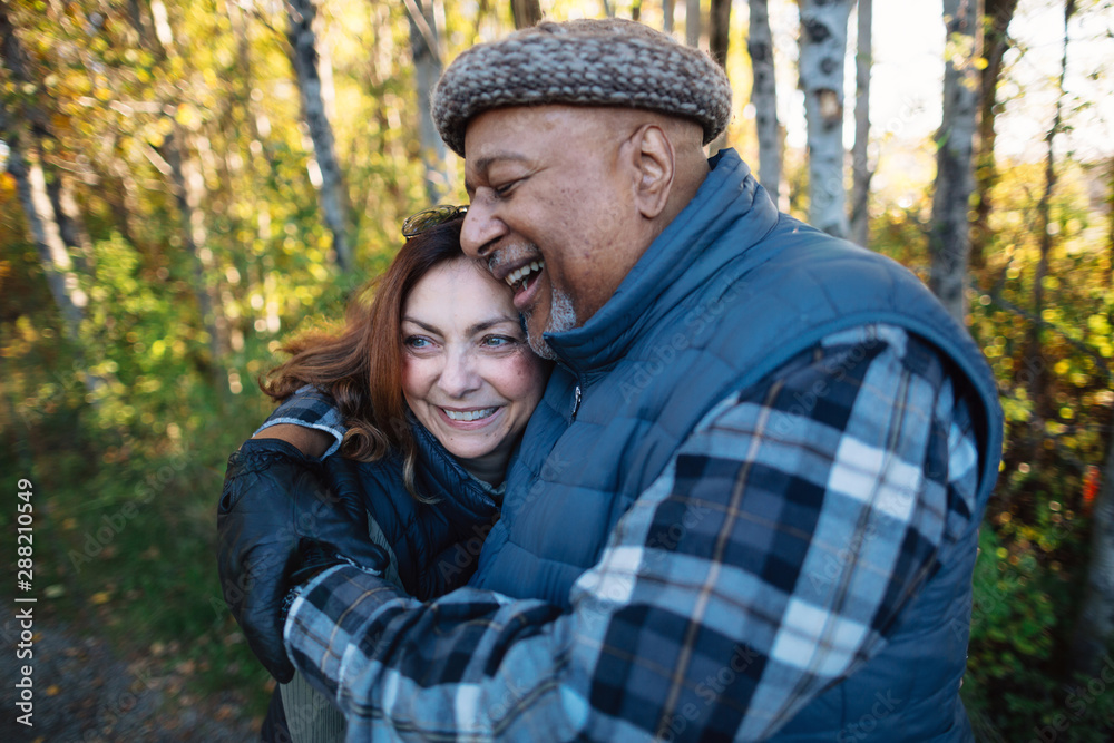 Smiling older couple outside Smiling older couple outside