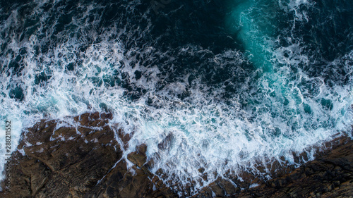 Aerial view of ocean waves and fantastic Rocky coast. Lofoten, Norway