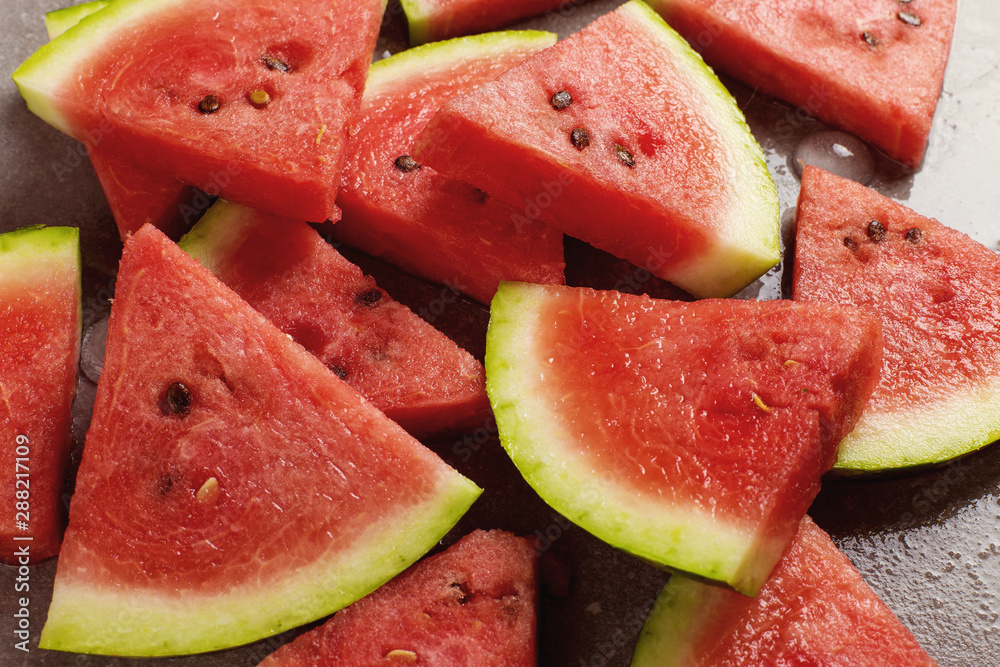 Sliced pieces of watermelon, chilled with ice, refreshing summer berry. Sliced pieces of watermelon, chilled with ice, refreshing summer berry.