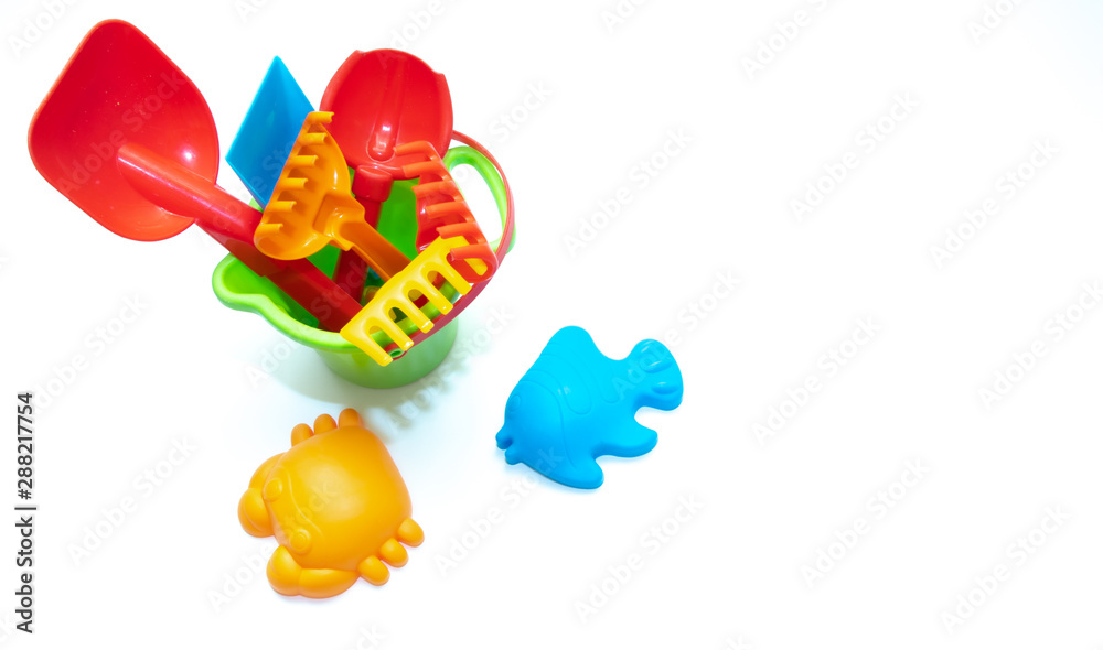 Plastic toys for sand isolated on white background. Kids toys.