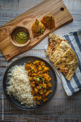 Indian Food with Rice and Naan Bread