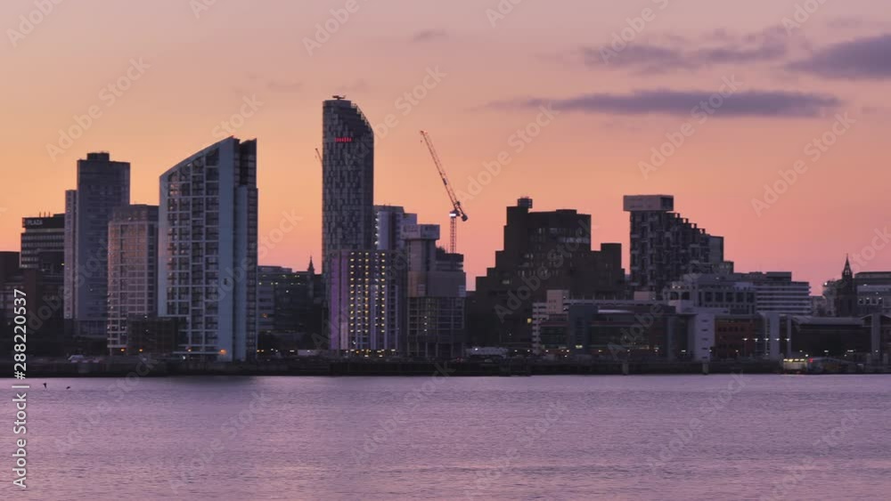 liverpool city skyline waterfront on mersey river at dawn pan liverpool city skyline waterfront on mersey river at dawn pan