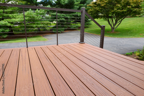 Composite Wood Deck with Metal Railing photo