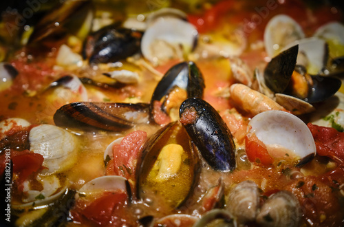 Fototapeta Naklejka Na Ścianę i Meble -  Close-Up Of Seafood Cooking In Pan
