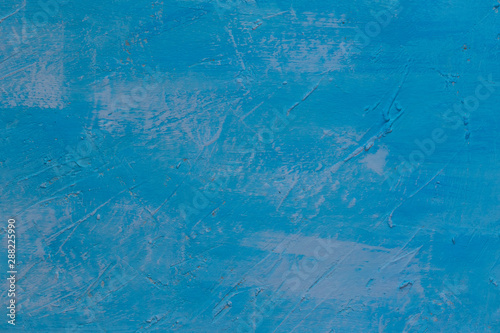 Background in the form of a wooden surface, first putty, and then painted blue with light spots