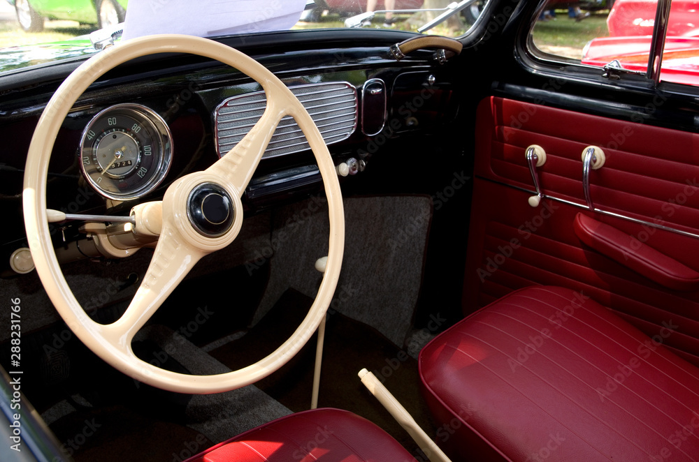 Red Leather Interior of an Antique European Automobile