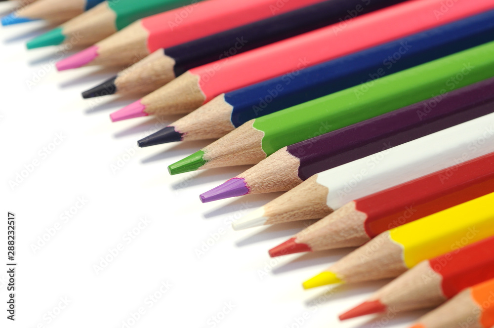 Color pencils isolated on white background. Close up. selective focus. Color pencils isolated on white background. Close up. selective focus.