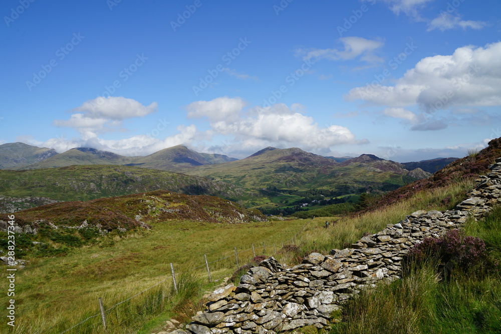 Stone Wall and Structures on a Rural Landscape in Wales Stone Wall and Structures on a Rural Landscape in Wales