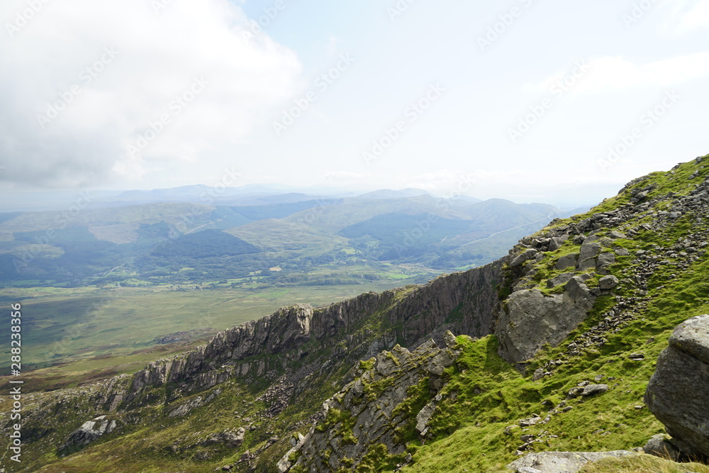 Naklejka premium High Mountain Range with Brilliant Blue Sky and Clouds - Wales UK