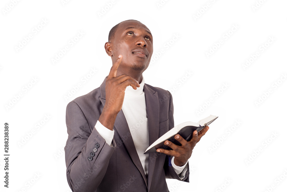 portrait of young man with a Bible in his hand. portrait of young man with a Bible in his hand.