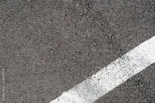 Wallpaper Mural Asphalt texture with white line and tire marks . Top view Torontodigital.ca