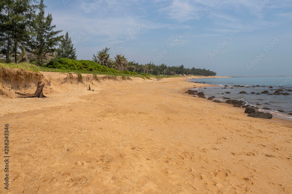 Haikou beach and sea, palms Hainan, China Haikou beach and sea, palms Hainan, China