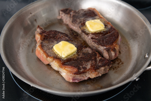 Grass Fed Beef Steak Cooked on Hot Skillet