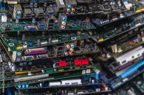 Closeup shot of computer mainboards laying on top of each other