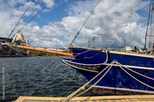 tall ship bowsprit and the Midland, Ontario, town dock photo