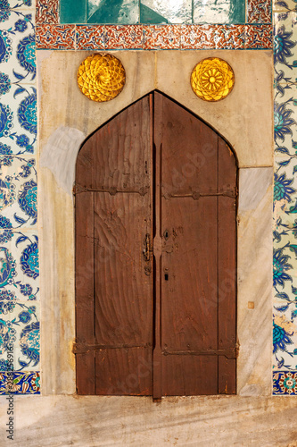 Istanbul, Turkey, 05/22/2019: Old wooden door in the harem of the Sultan in Topkapi Palace. photo