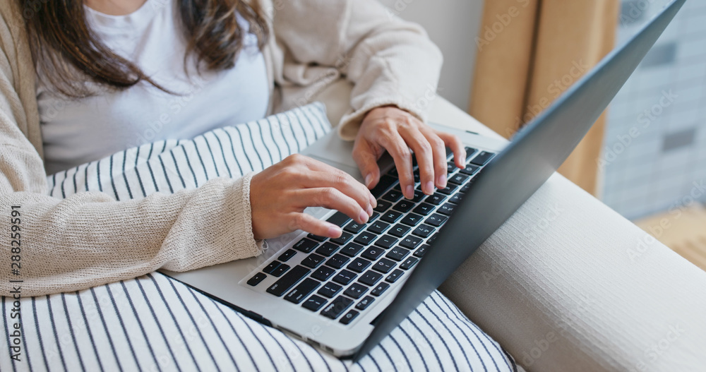 Woman works on computer at home Woman works on computer at home